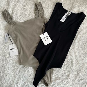 Aritzia small body suits. Never been worn! Sold as a bundle.